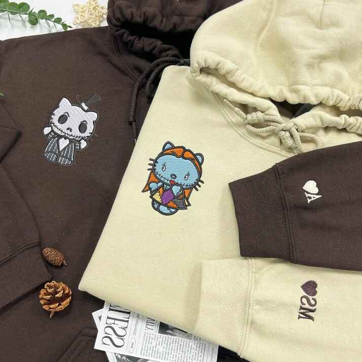 Dark brown and beige Hello Kitty couple hoodies inspired by Jack and Sally, perfect Halloween couple outfit.
