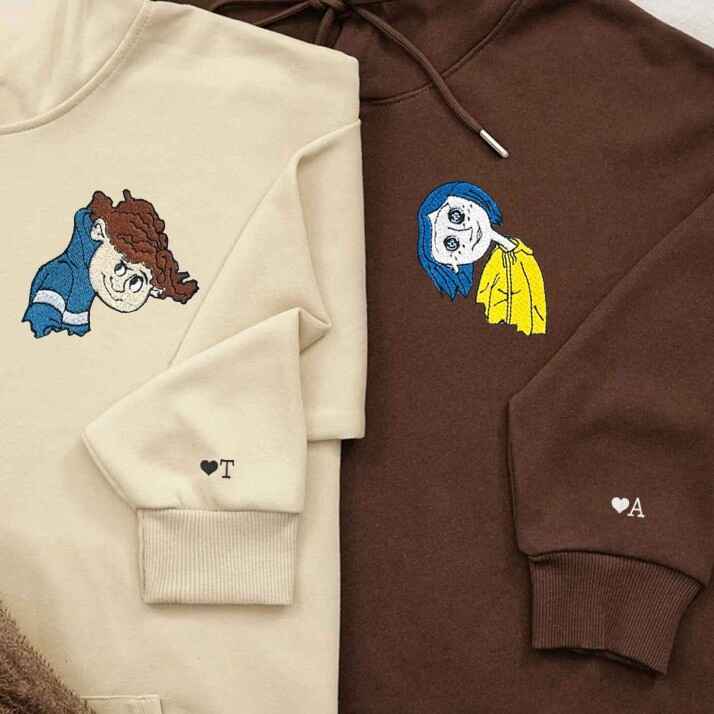 Dark brown Coraline-inspired embroidered matching couple sweatshirts, perfect for fantasy fans.
