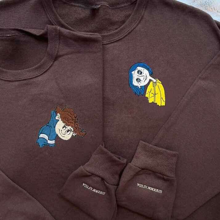 Unique couple sweatshirts featuring Coraline character embroidery in dark brown, cozy and stylish.
