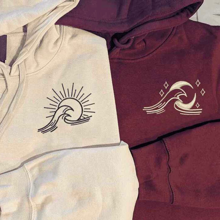 Sun and moon wave embroidered couple hoodies.
