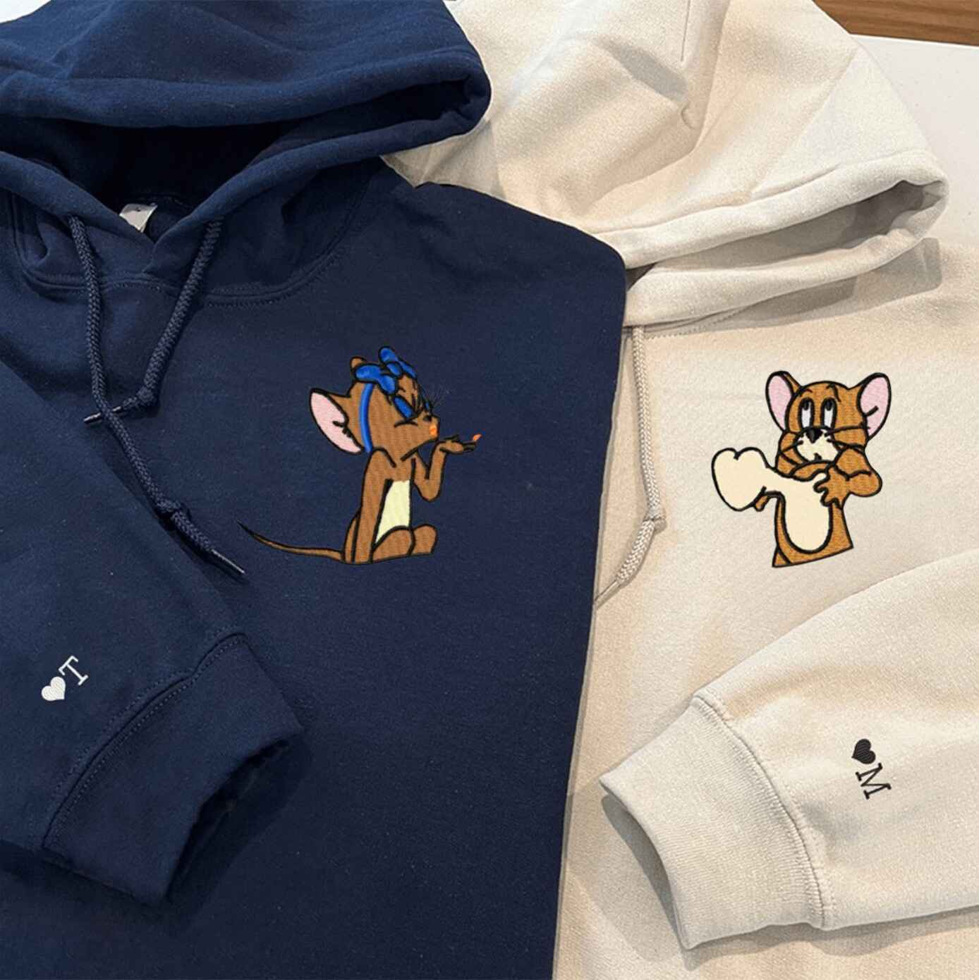 Playful matching hoodies with classic Jerry character embroidery
