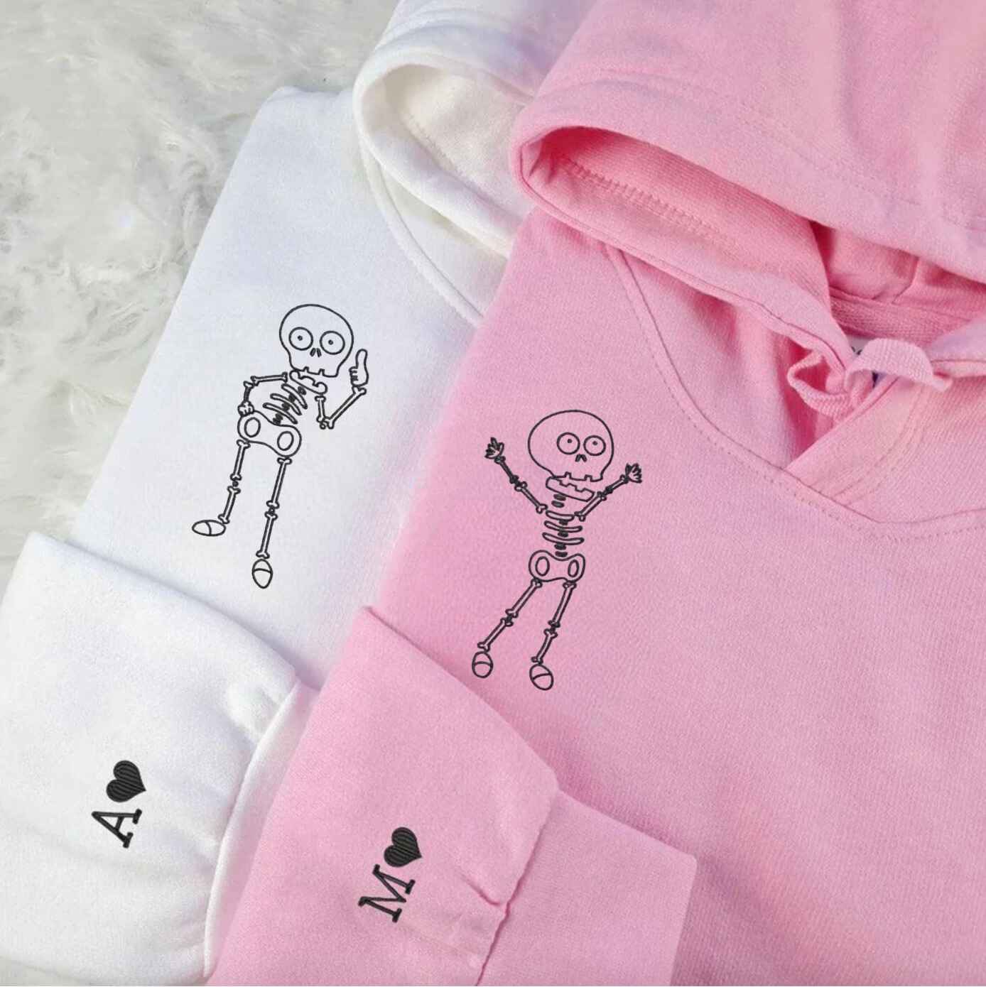 Matching Couple Hoodies with couples matching hoodies design featuring playful skeleton characters
