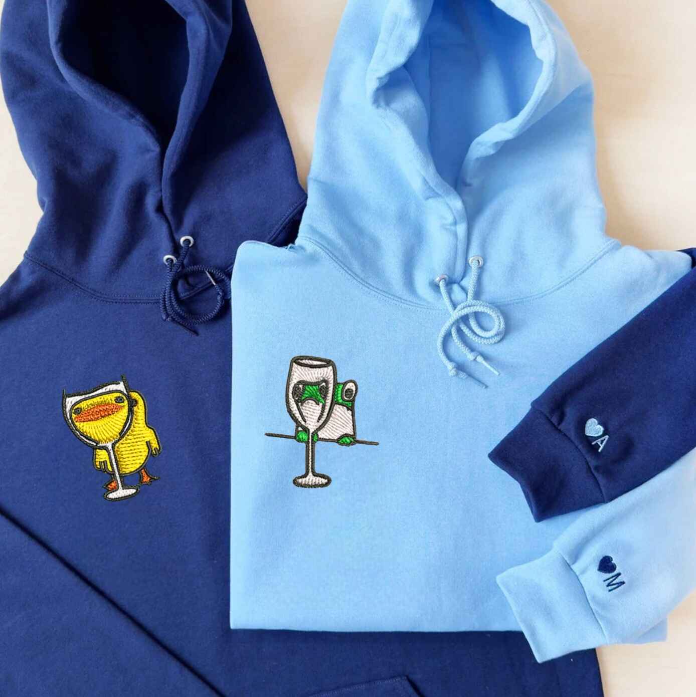 Couple hoodies featuring cute superhero cat characters
