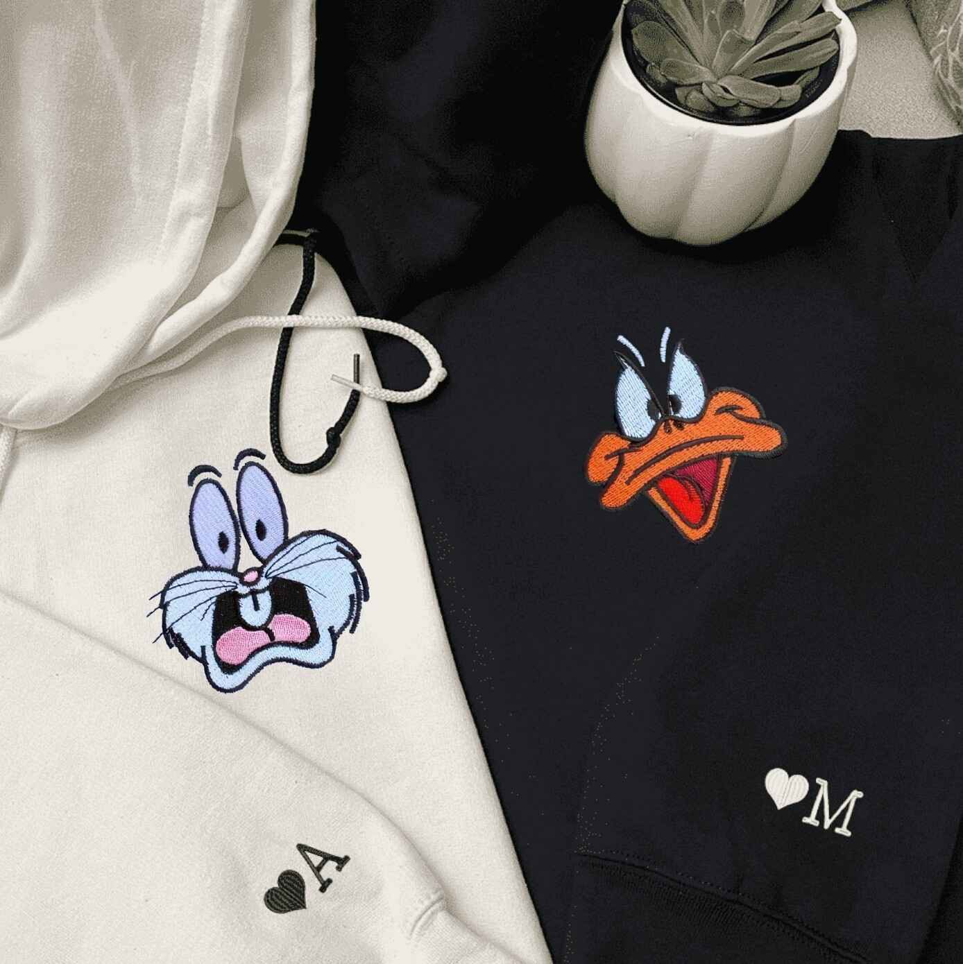 Matching Couple Hoodies with cartoon-inspired matching couple sweatshirts showcasing Bugs Bunny and Daffy Duck expressions
