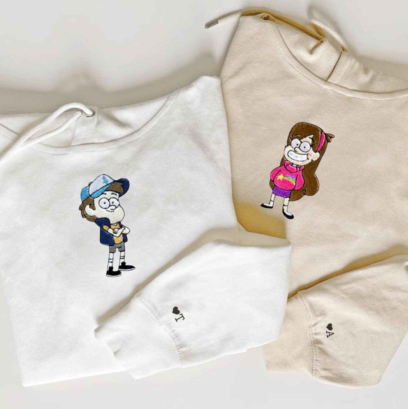 Mischievous Twins couple hoodies with fun sibling design
