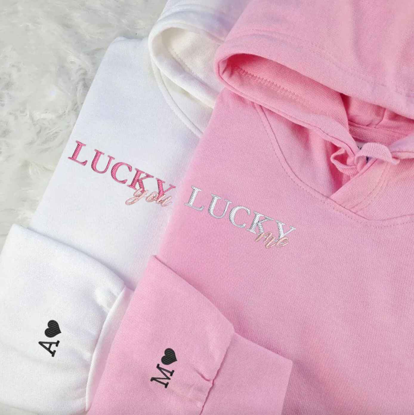 Embroidered couple hoodies with playful "Lucky" message for partners
