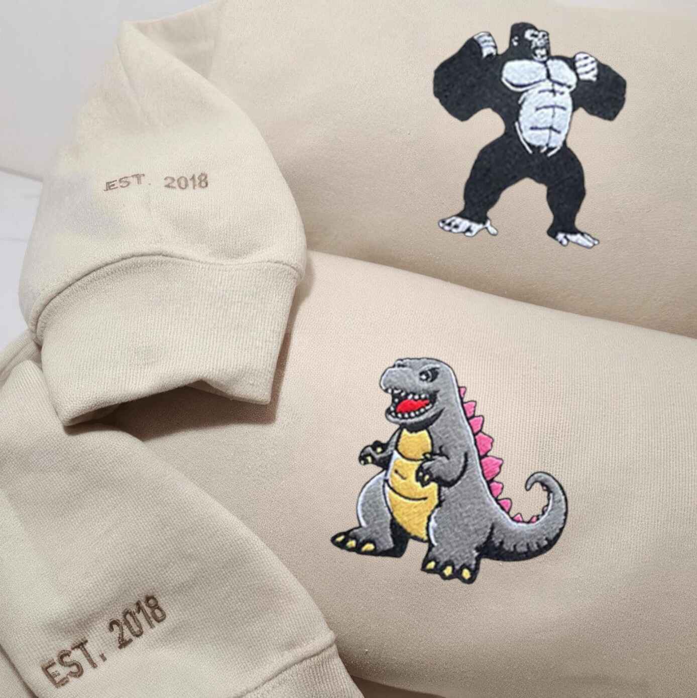 Matching Couple Hoodies - custom couple hoodies with powerful King Kong and Godzilla designs
