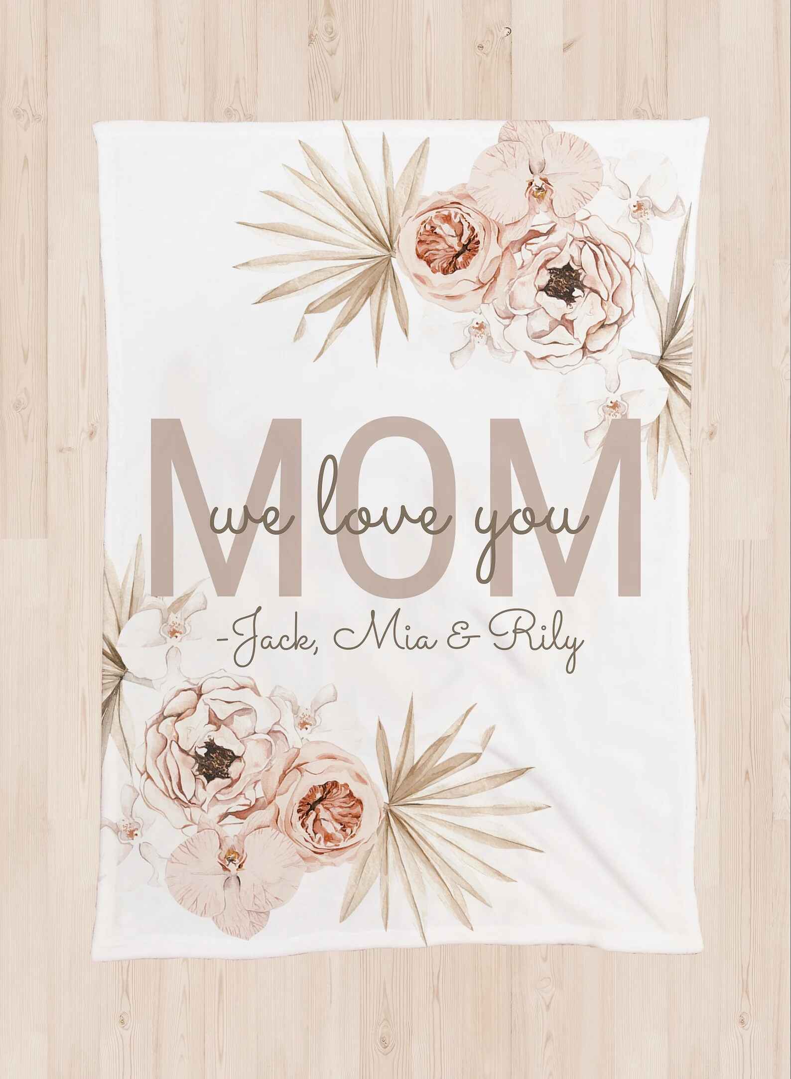 Custom name blanket with floral design and personalized message from family or friends