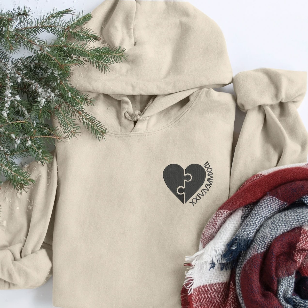 Matching Heart Puzzle Roman Numeral hoodies with custom names and dates, symbolizing love and connection.