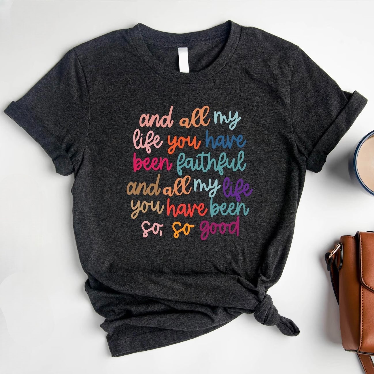 Vibrant and inspirational graphic tee with colorful design.