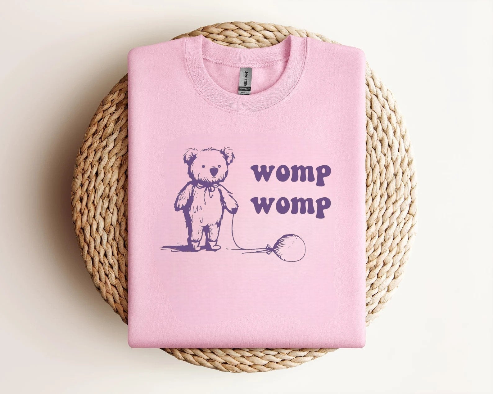 Cute bear design with "Womp Womp" printed on casual t-shirt