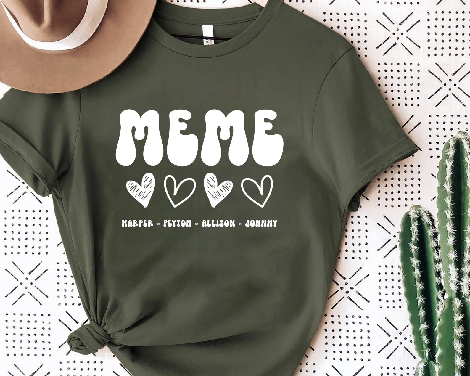 Customizable meme shirt in green with white text and heart details
