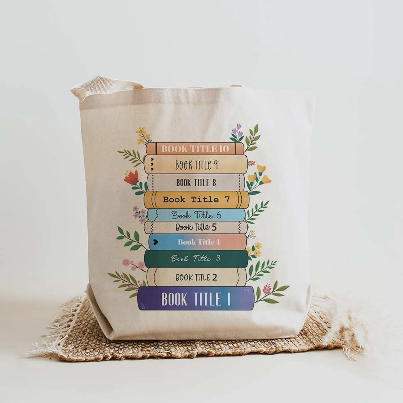 Eco-friendly canvas tote bag with book stack design"