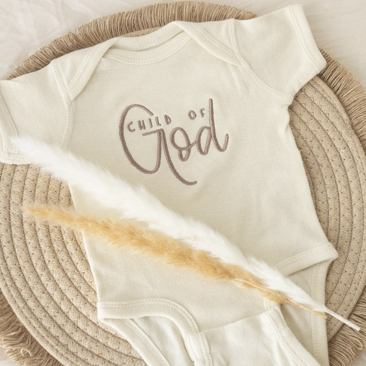 Child of God Baby Onesie Soft Beige Color