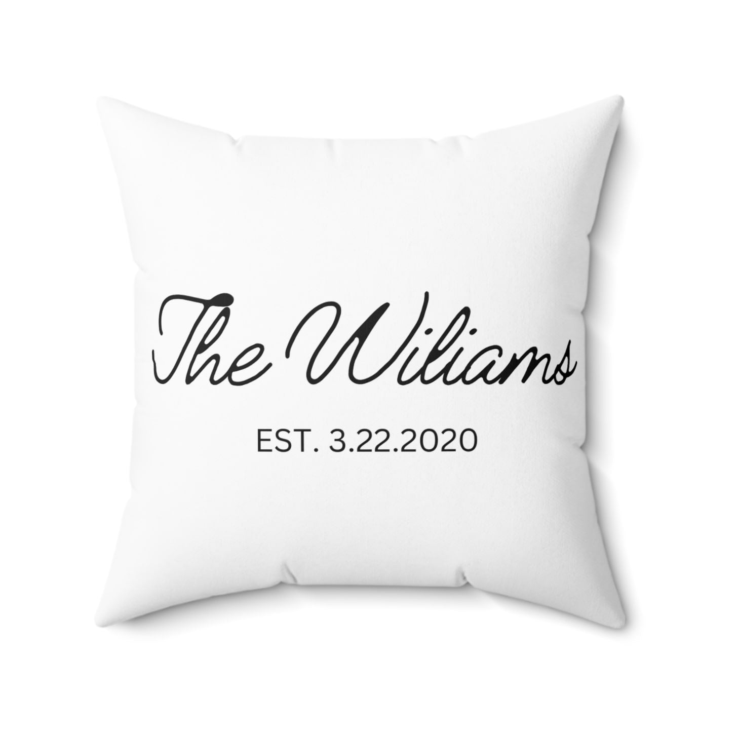 Personalized throw pillow with family name "The Wiliams"