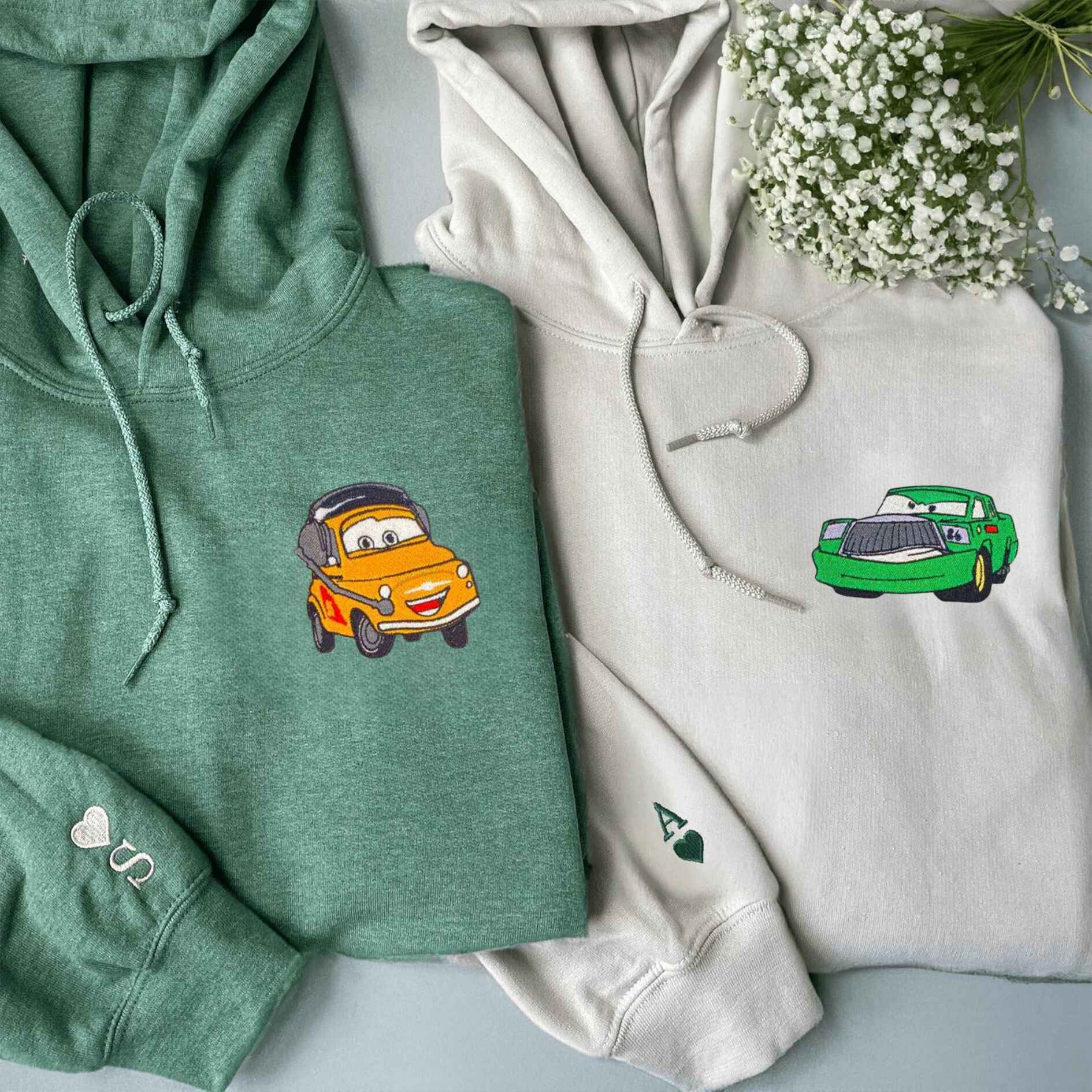 Car-themed couple hoodies with yellow and green car embroidery
