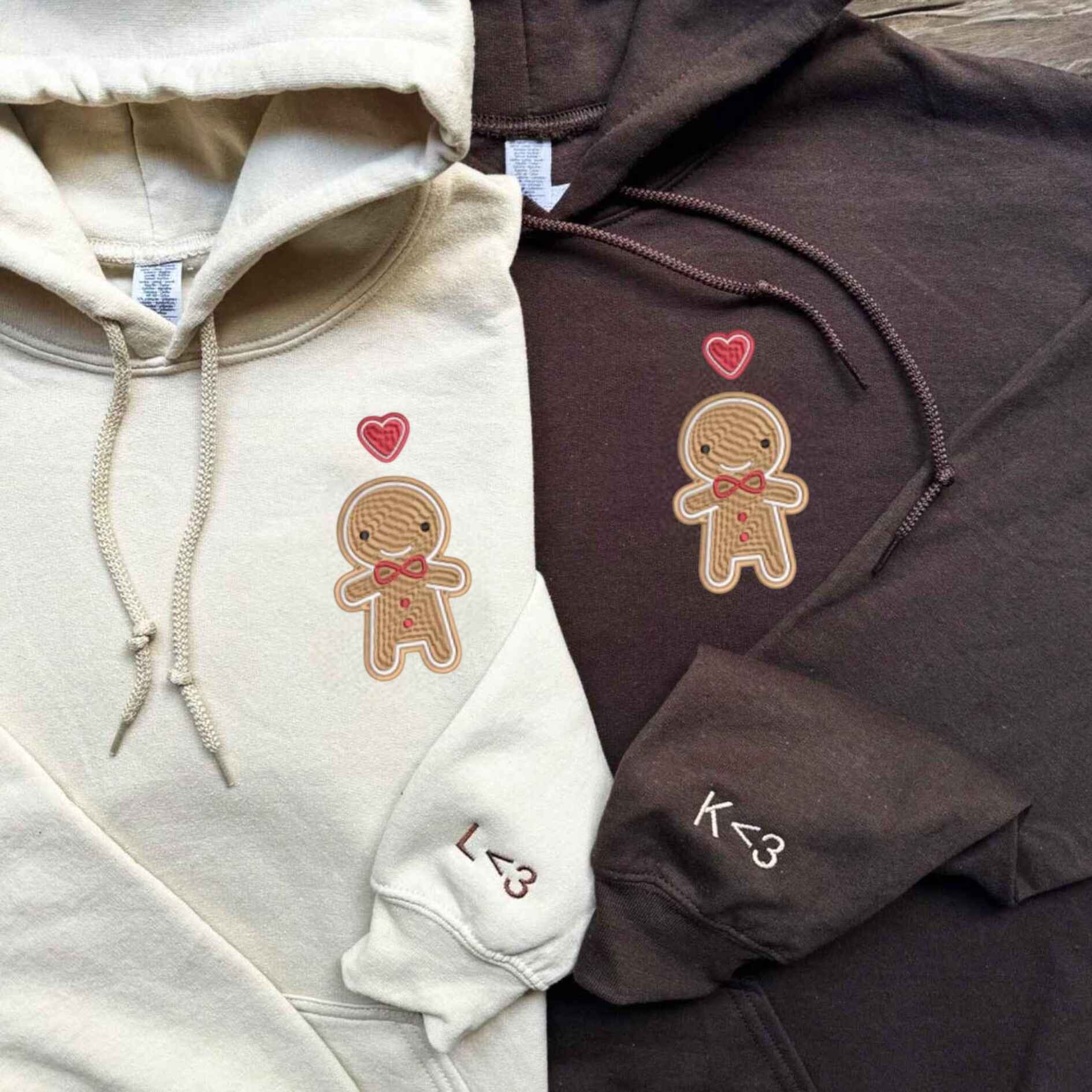 Matching couple hoodies with festive gingerbread man and heart embroidery
