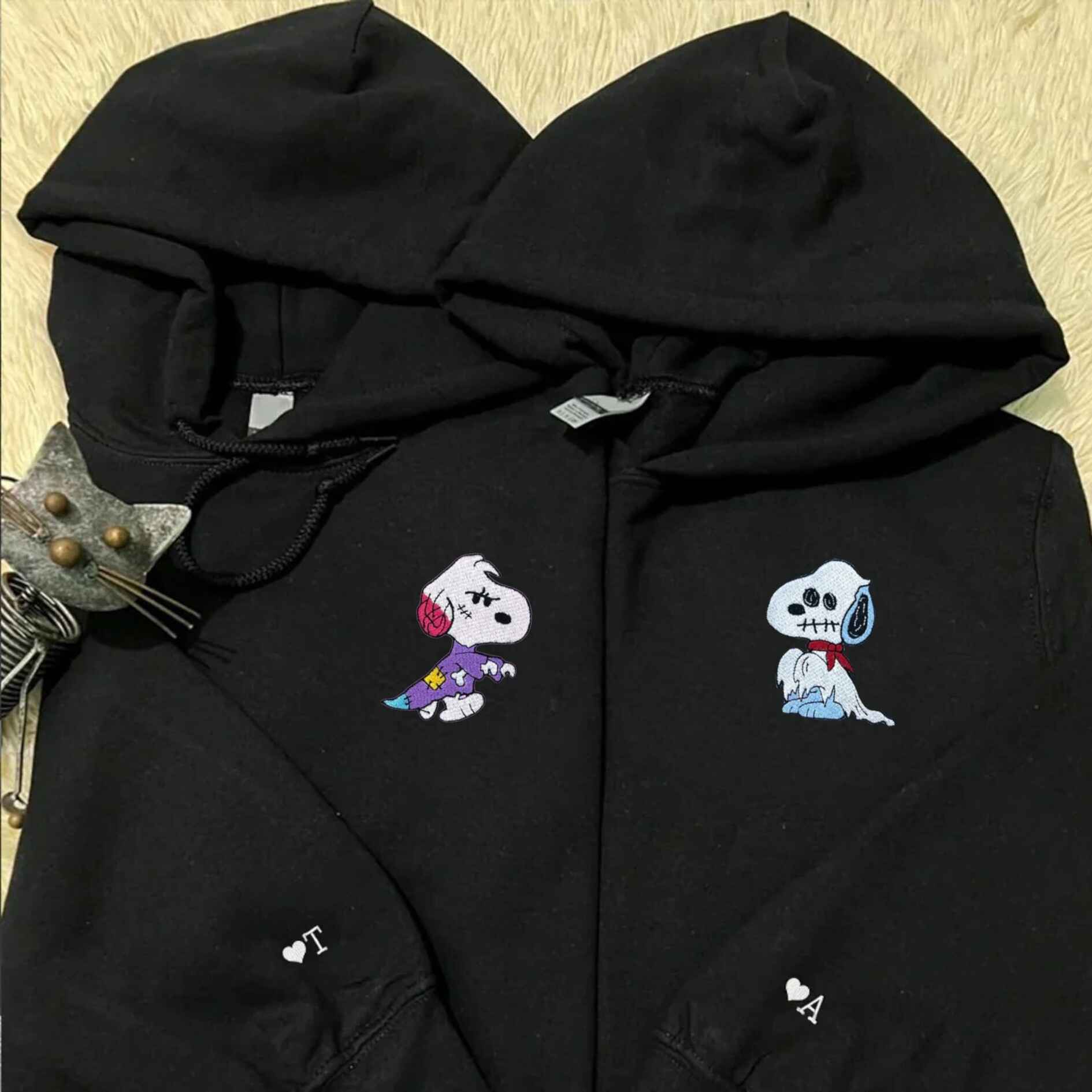 Matching Halloween hoodies with ghost characters and custom names
