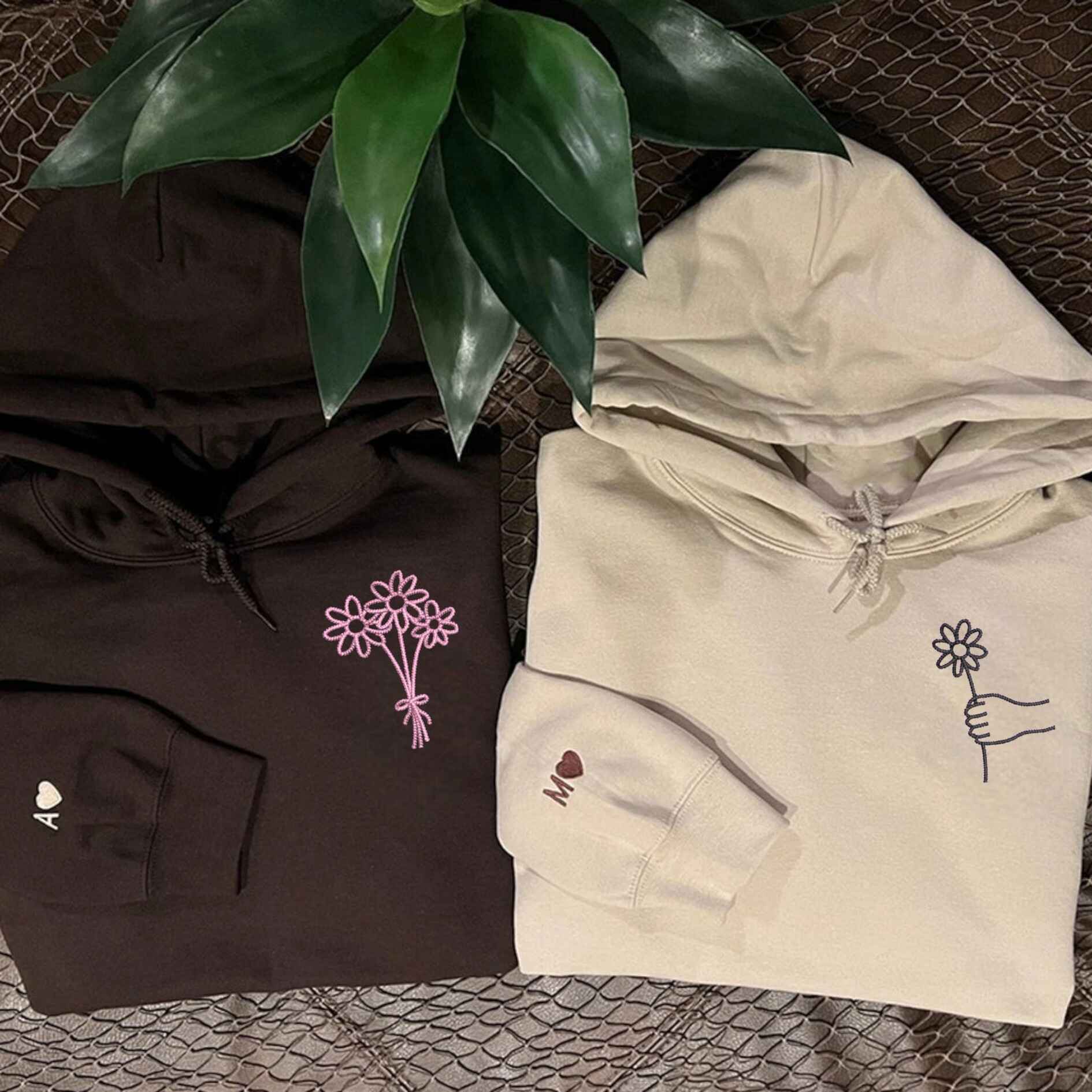 Matching couple hoodies with simple flower embroidery for couples
