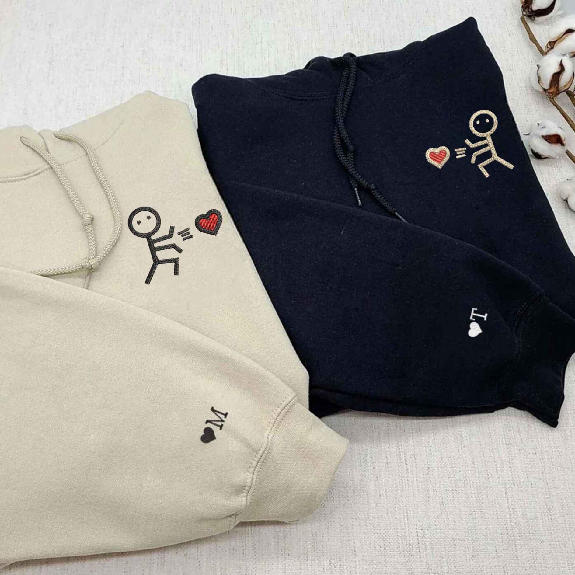 Cute stick figure couple hoodies with heart detail
