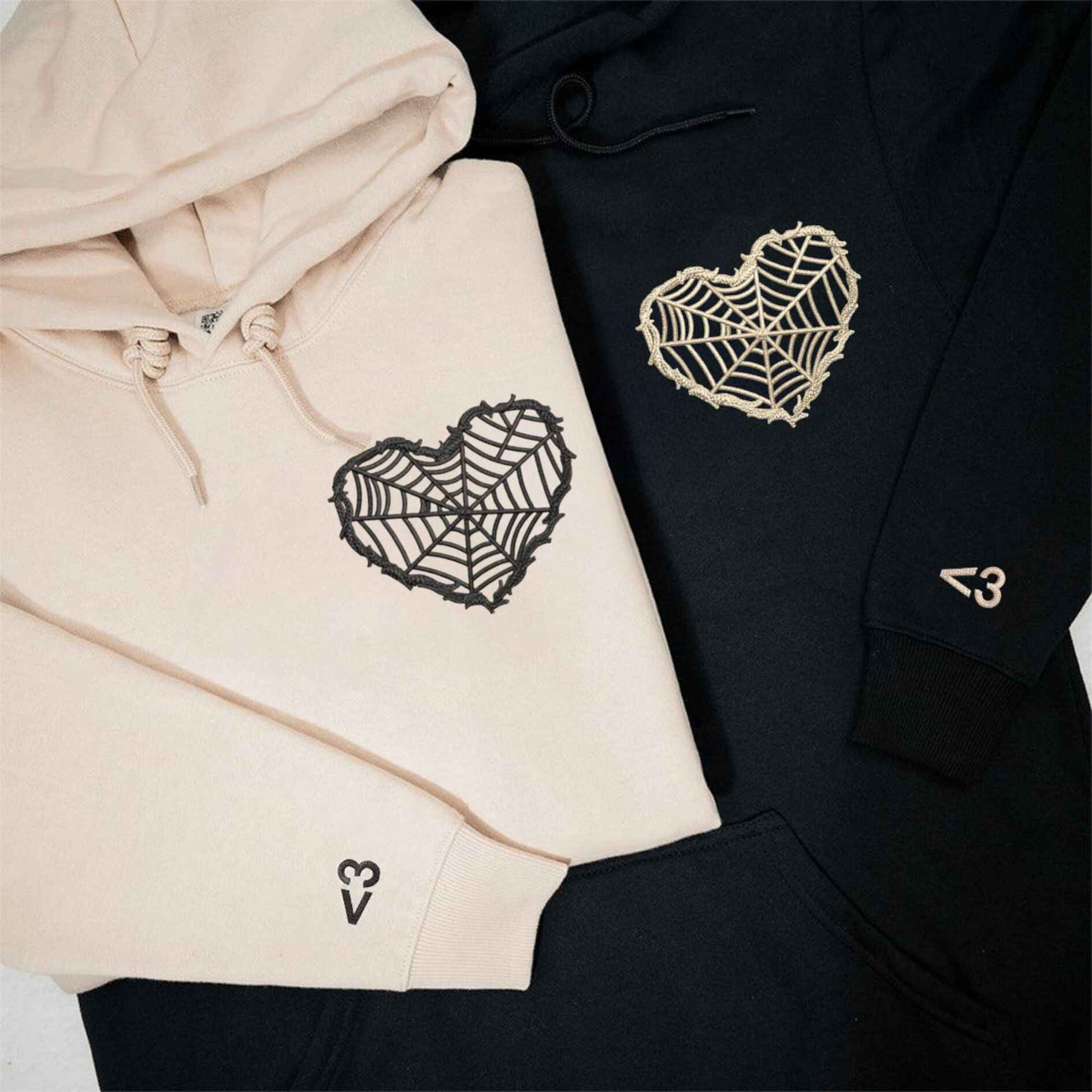 Gothic-style couple hoodies with personalized spider web heart design
