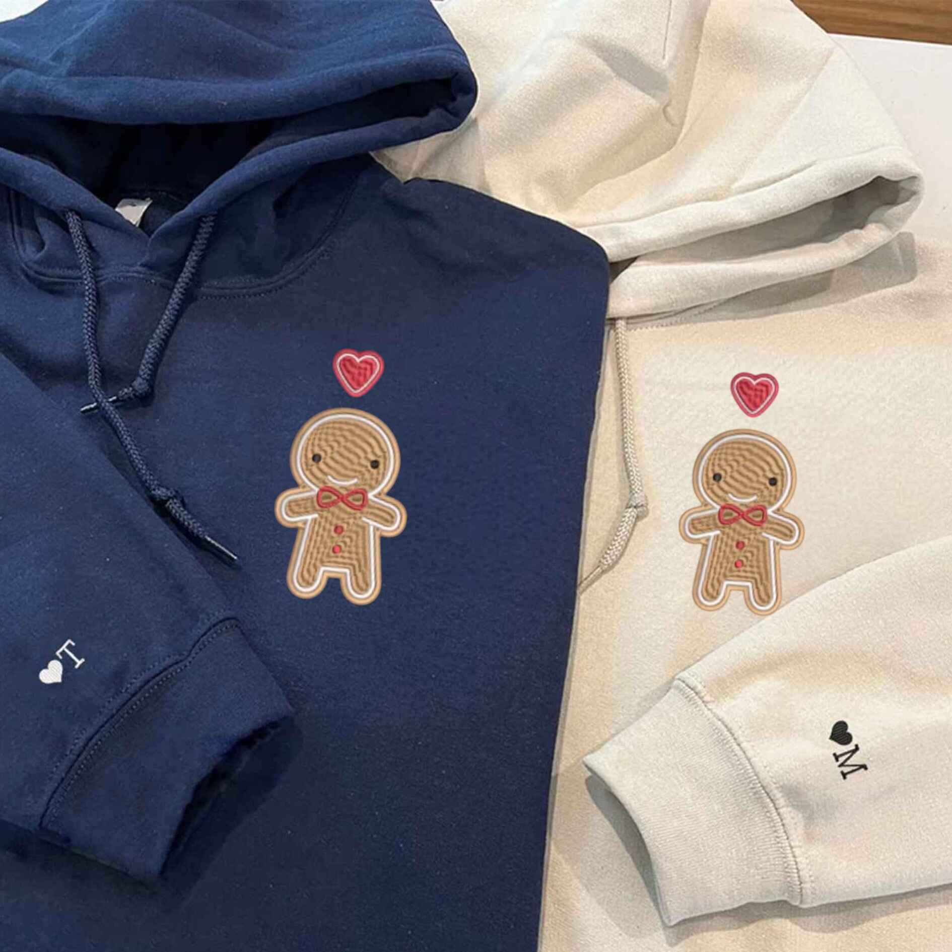 Cute holiday hoodies for couples featuring gingerbread figures and custom initials
