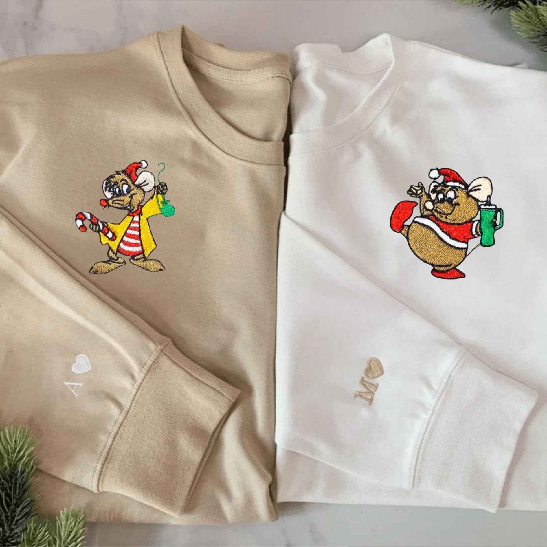 Cozy couple sweatshirts with Christmas mouse embroidery and holiday details
