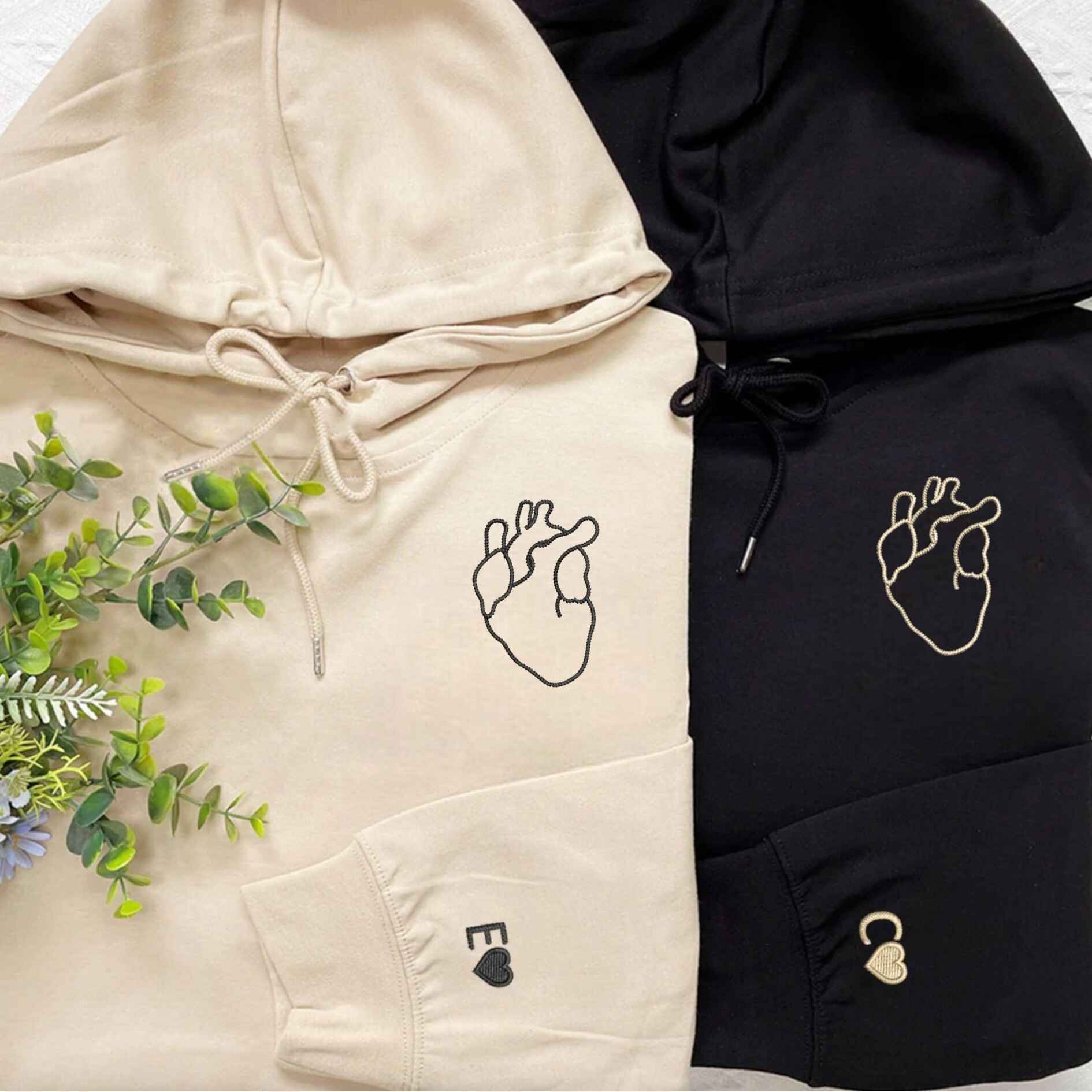 Minimalist anatomical heart embroidered matching hoodies for couples
