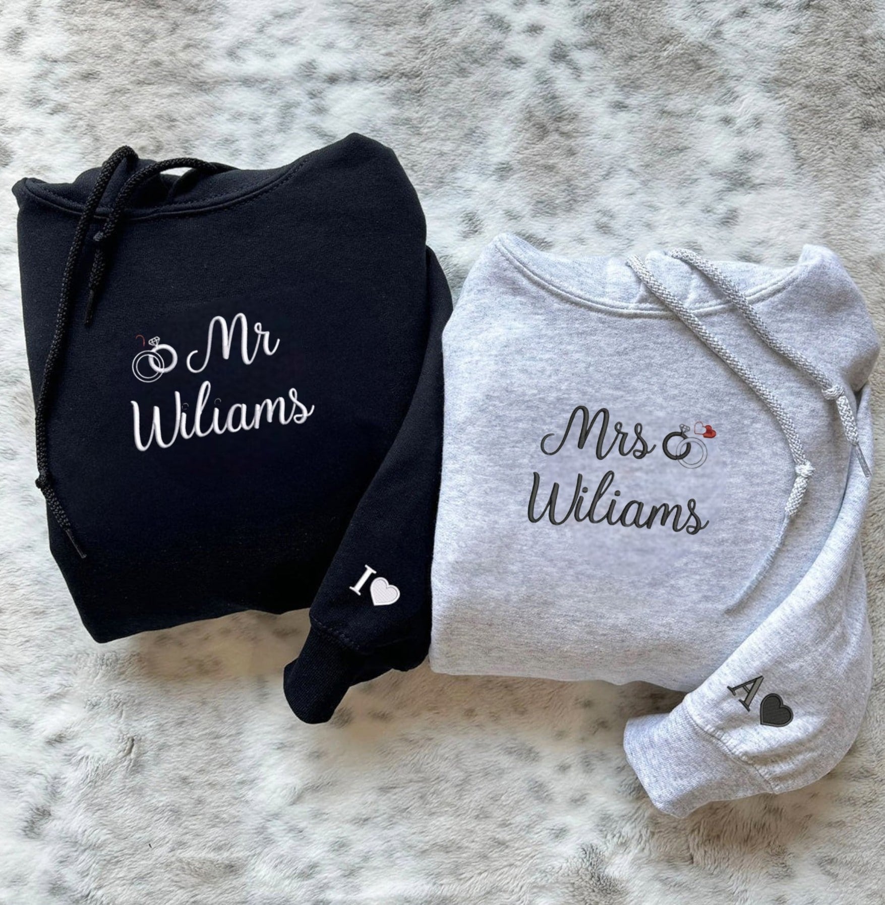 Customizable couple hoodies with elegant ring designs and heart details.