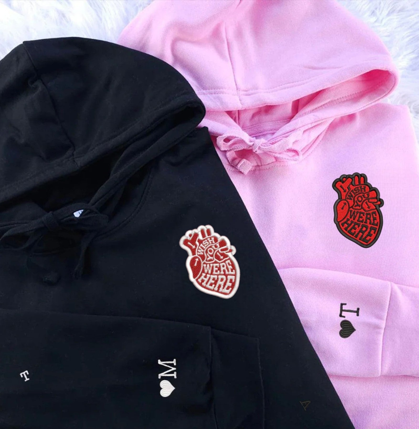 Stylish and cozy sweatshirts for couples with a heartfelt embroidered heart design.