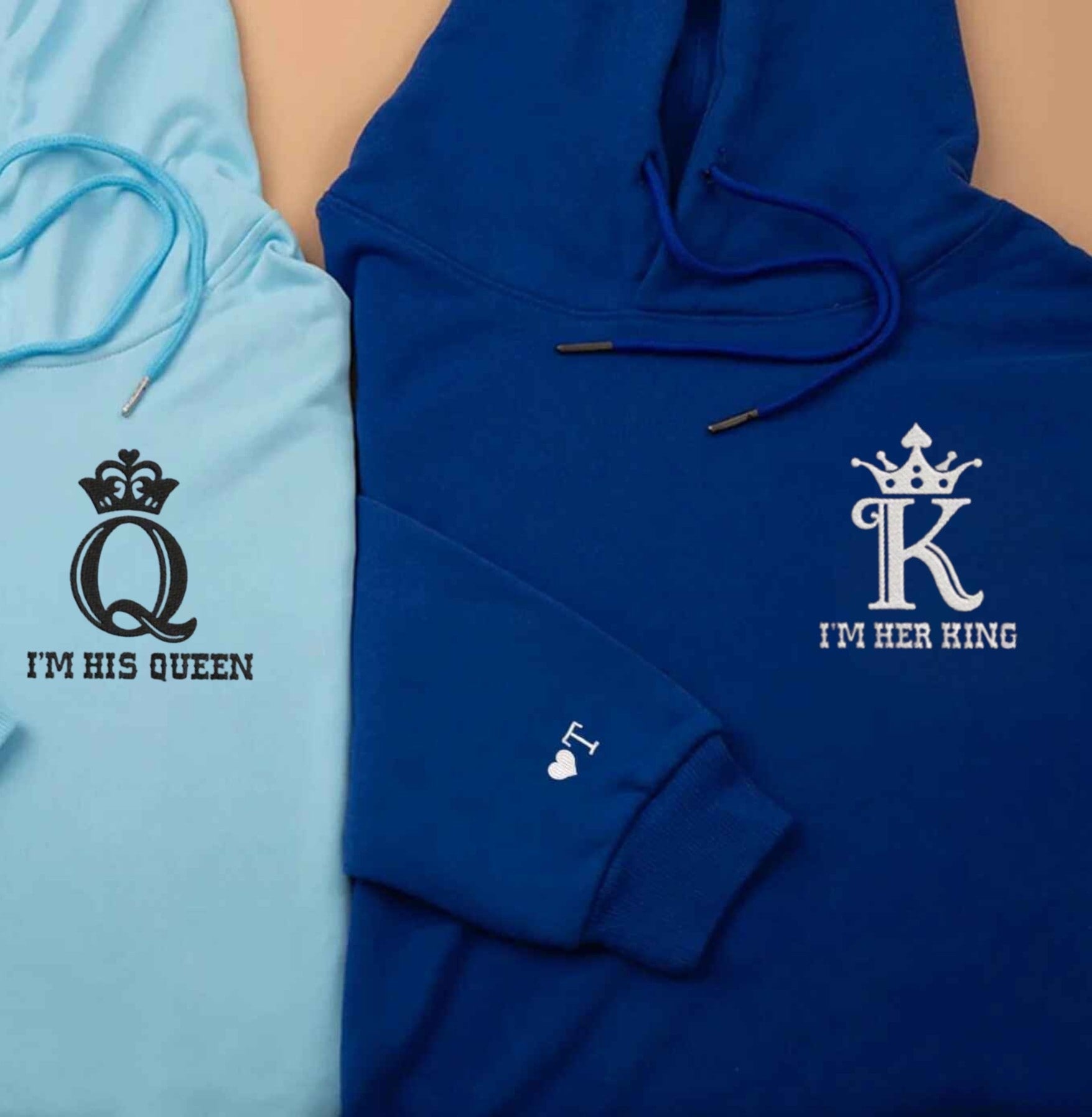 Matching His King & Her Queen hoodies with crown embroidery and regal designs.