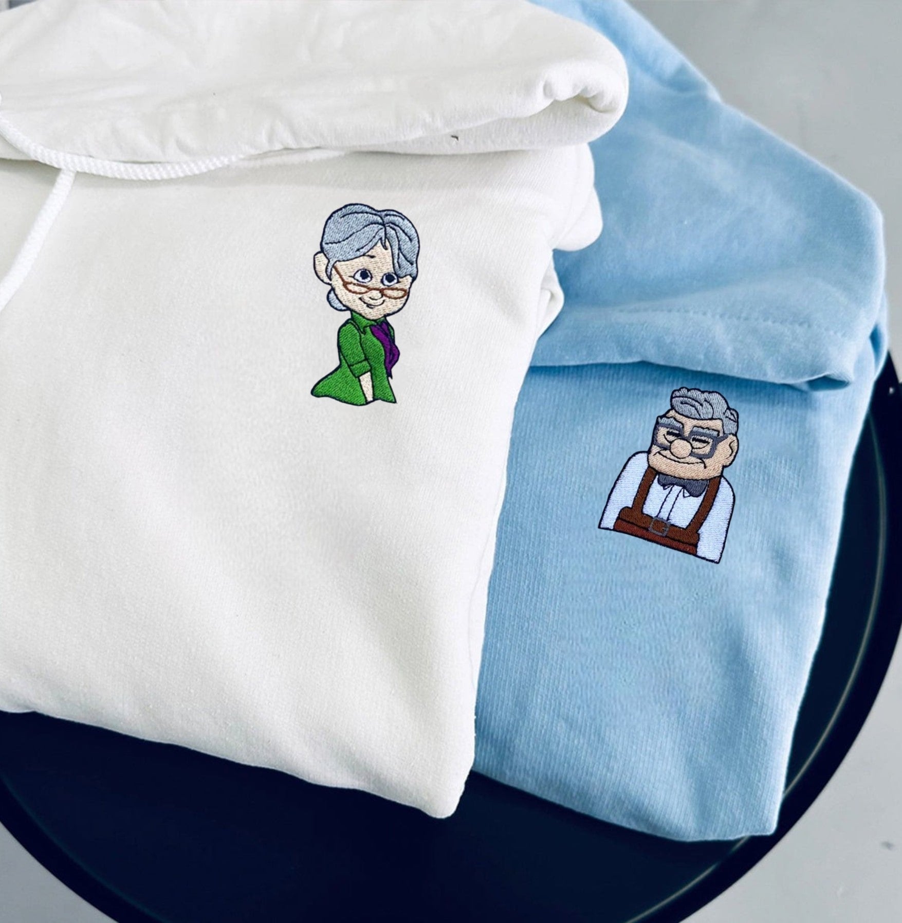 Soft and cozy hoodies featuring romantic movie characters and thoughtful details.