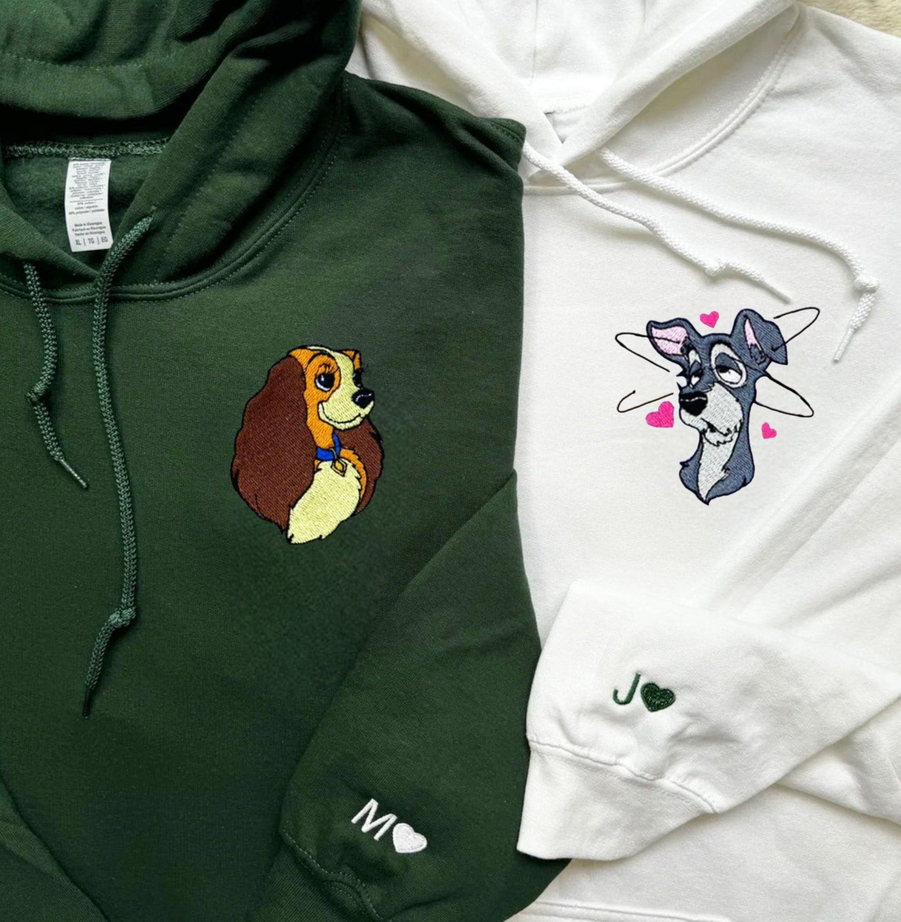 Green and white hoodies featuring sweet dog designs and custom initials on the cuffs.