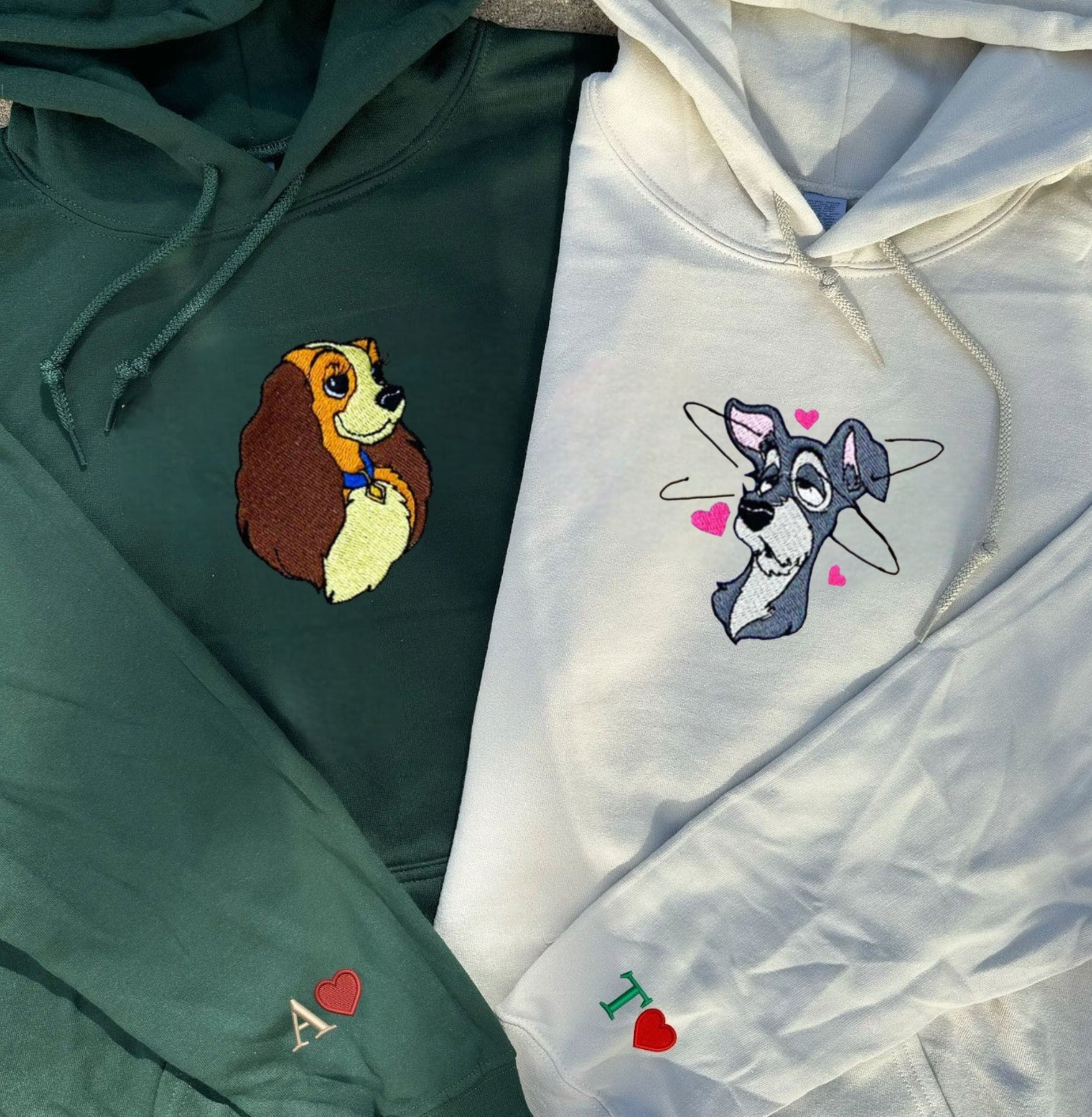 Matching dog-themed hoodies with cute character embroidery and cozy fit for couples.