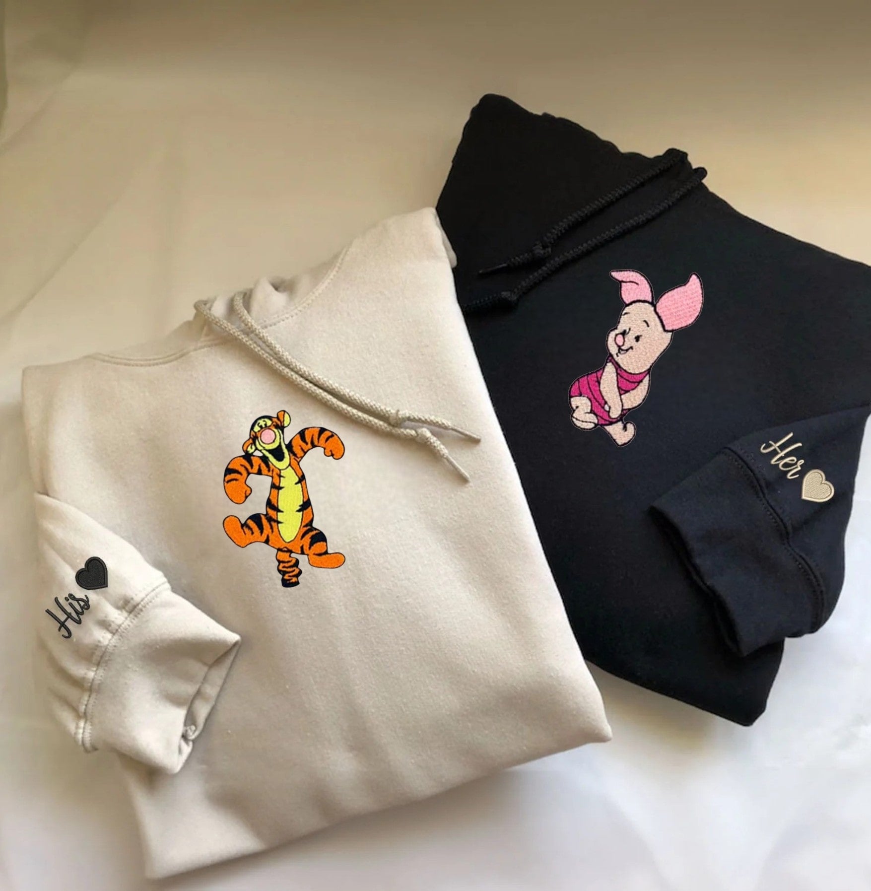 Pig and Tiger Couple Hoodies featuring playful embroidered characters for couples.