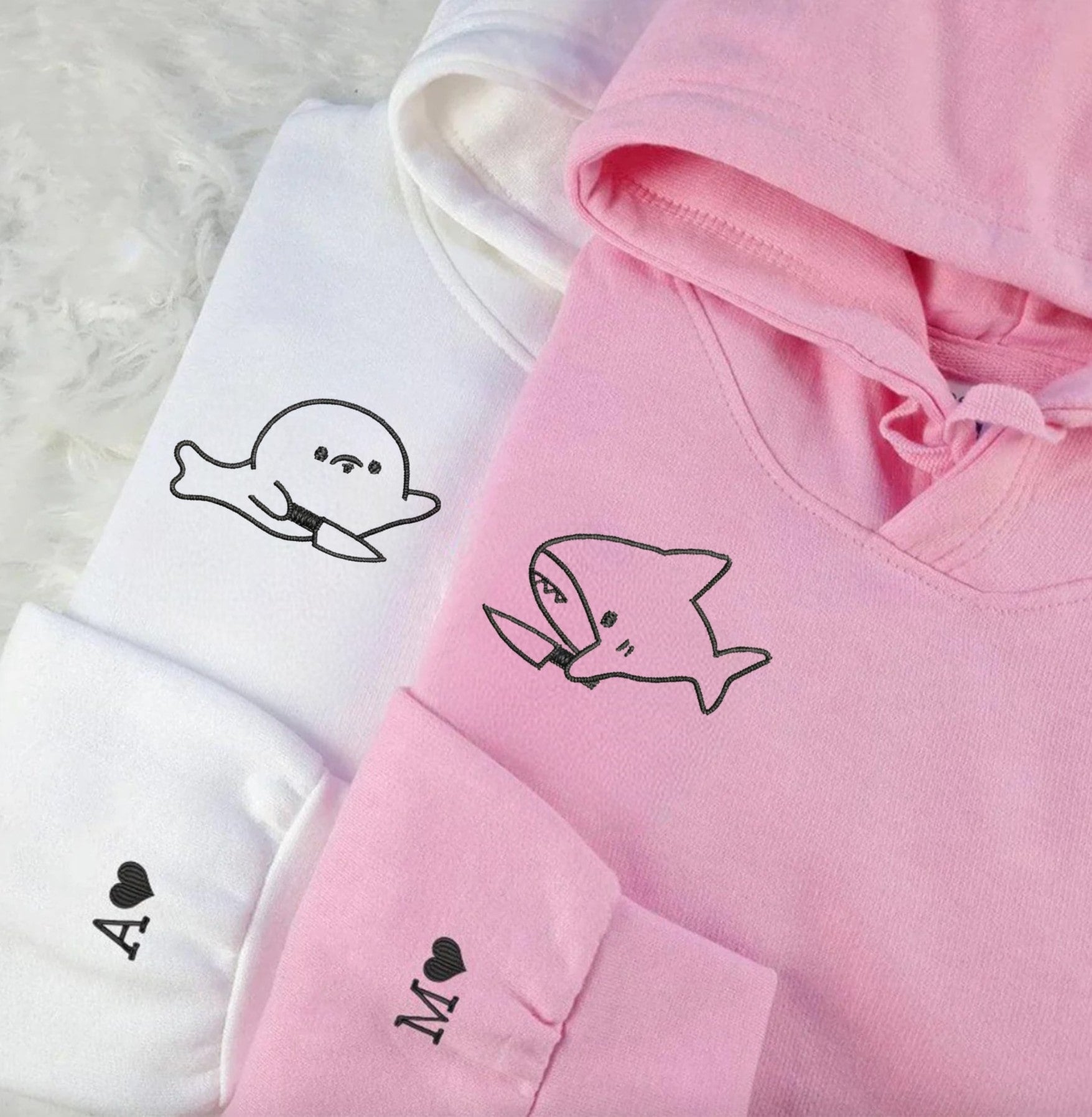 Shark and Seal Couple Sweatshirts showcasing fun knife designs and personalized details.