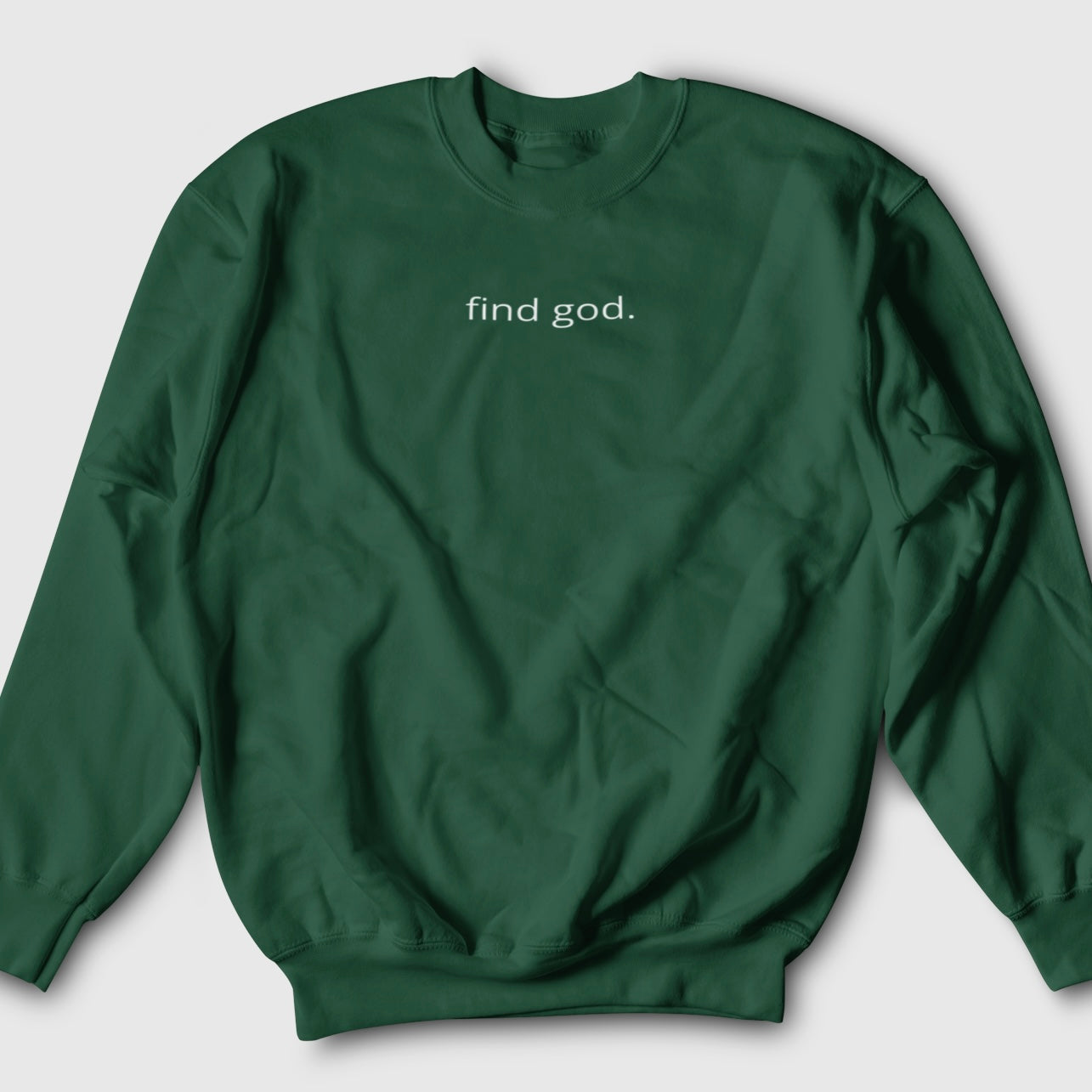 Green crewneck sweatshirt with 'find god' printed in white text.
