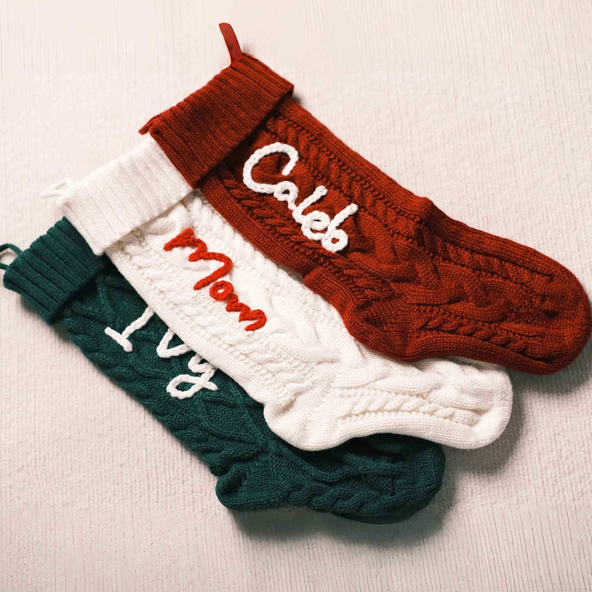 Custom embroidered family name stockings for holiday decor
