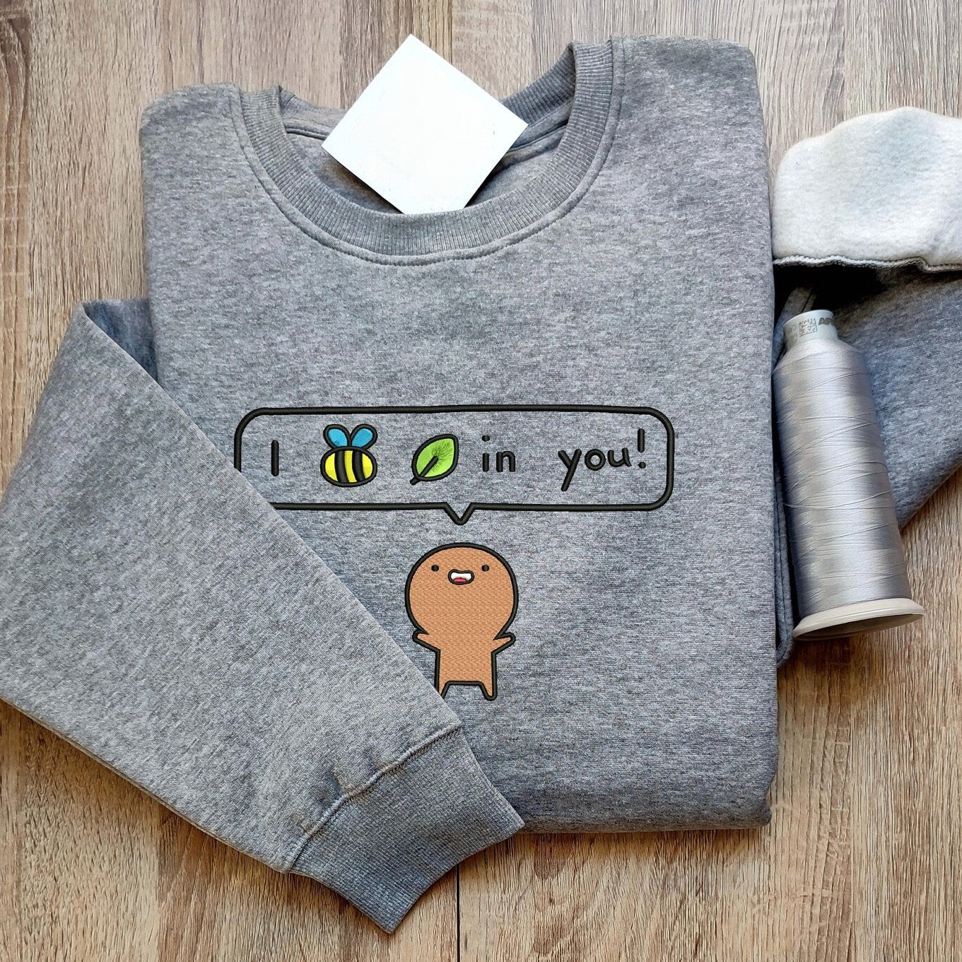 Custom embroidered graphic meme shirts with an uplifting “I Believe in You” message, capturing the essence of a t-shirt meme.
