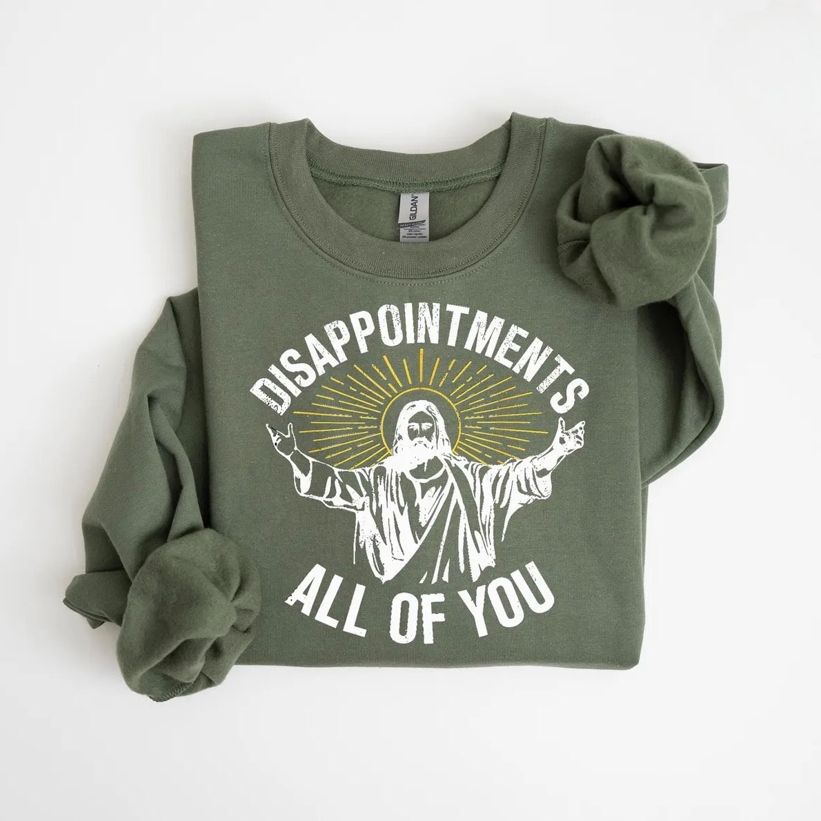 Jesus-inspired sweatshirt displayed with relaxed sleeves.
