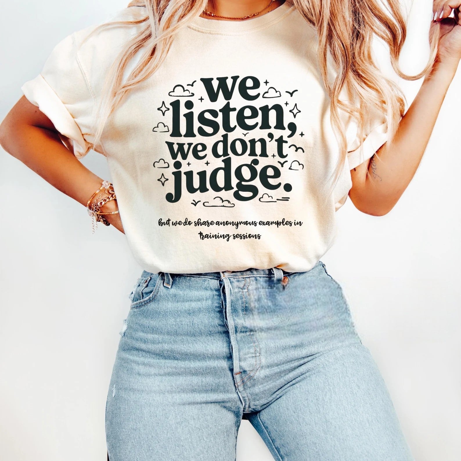 Beige We Listen, We Don’t Judge graphic t-shirt with fun design