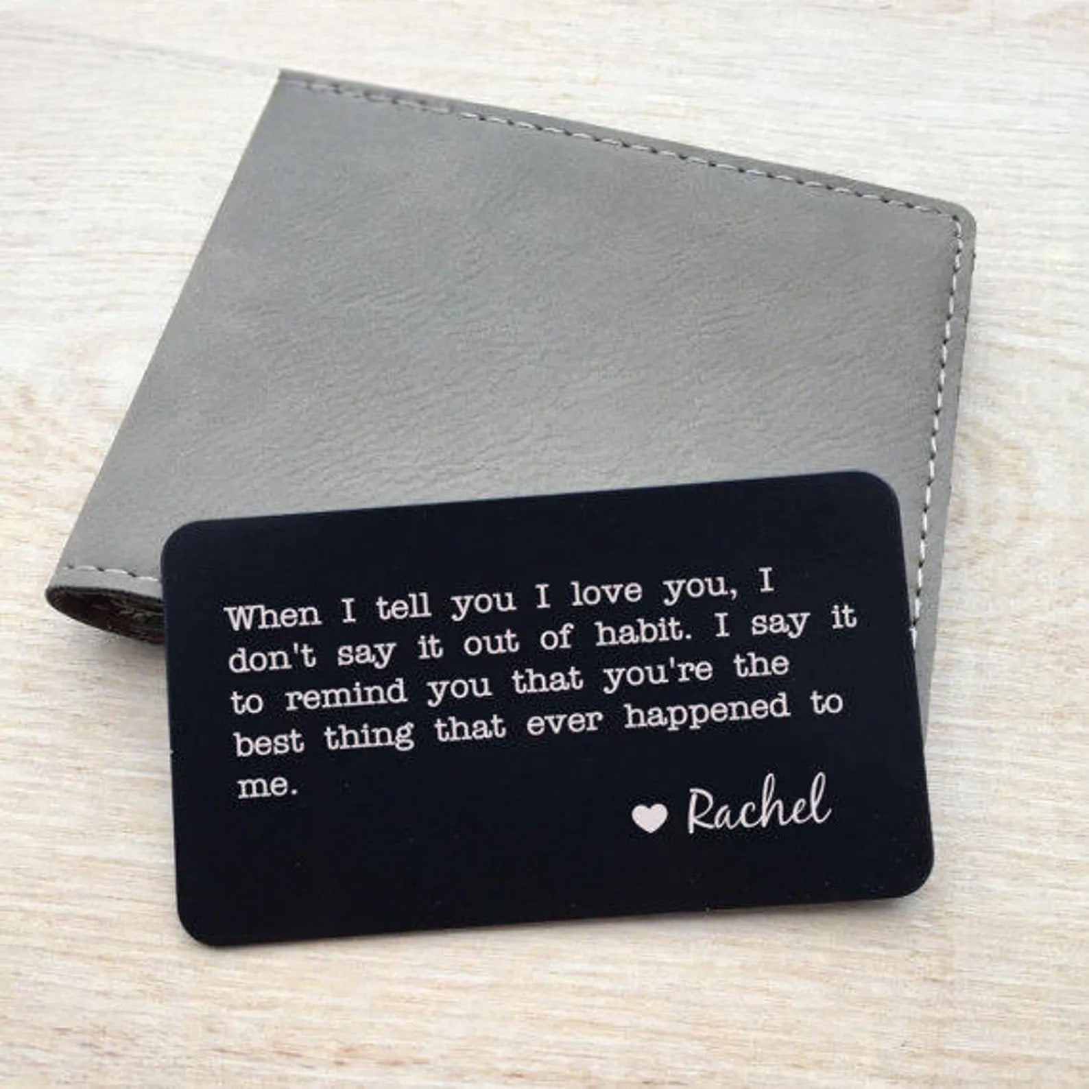 Custom engraved metal card with romantic quote for a loved one.