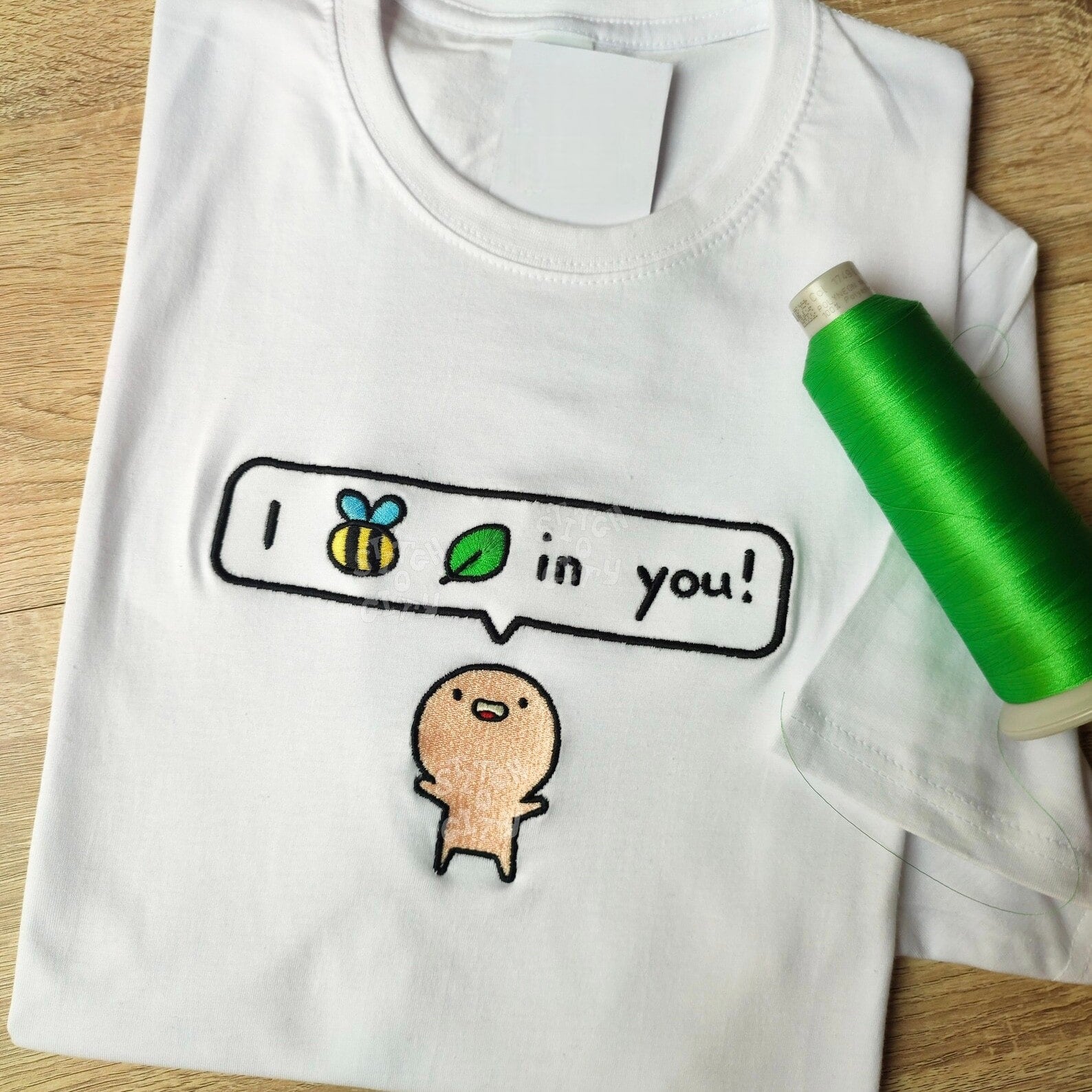 Custom embroidered graphic meme shirts featuring a cute motivational design, ideal for best gag gifts for men.
