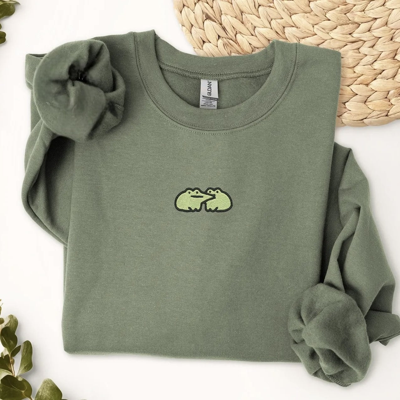 Green "Frog Butt" embroidered sweatshirt with cozy rolled sleeves