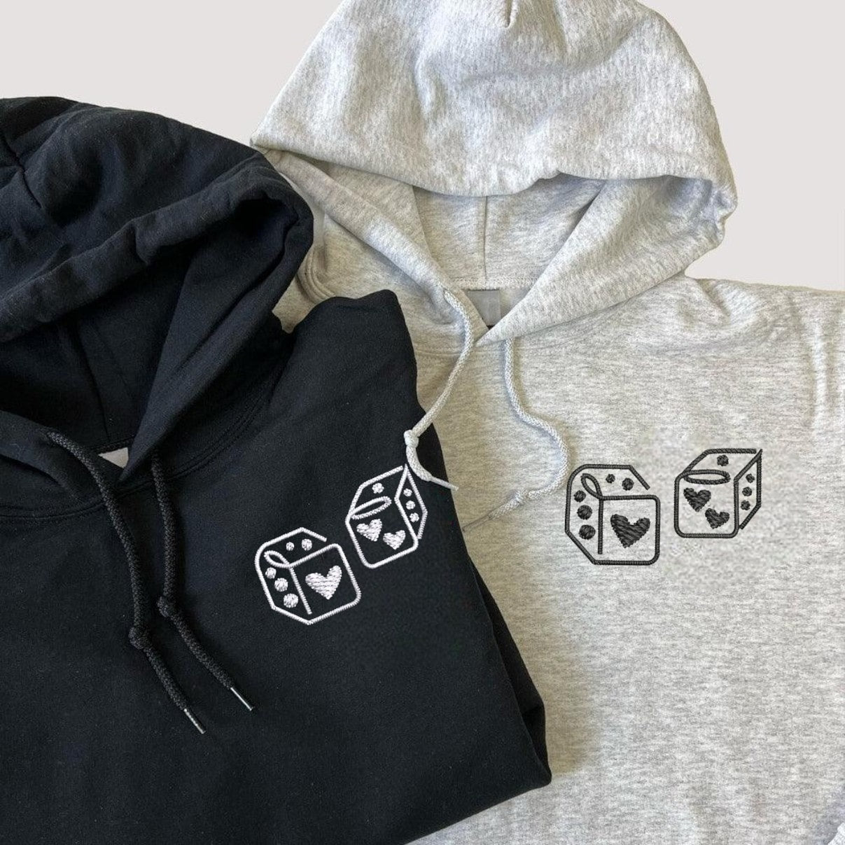 Matching Couple Hoodies featuring a custom dice design, perfect for matching couple sweatshirts.
