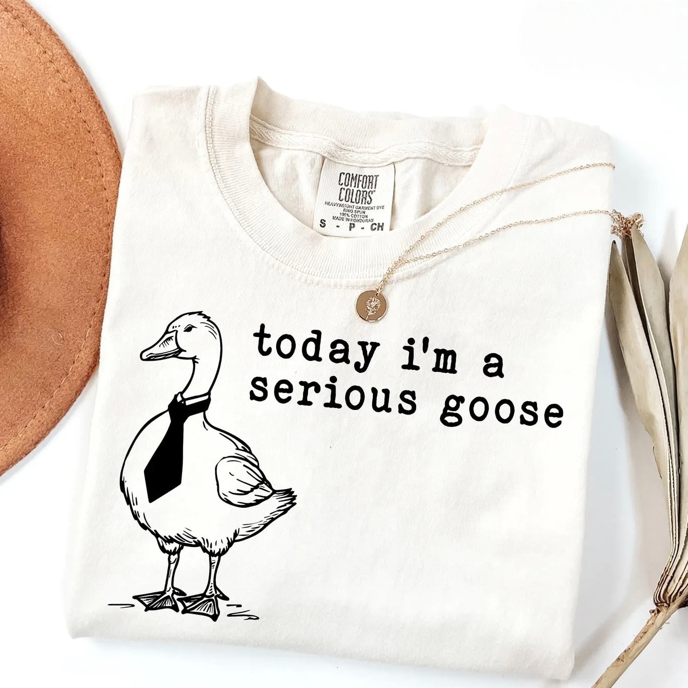 "Serious Goose" graphic tee in white with goose and tie design