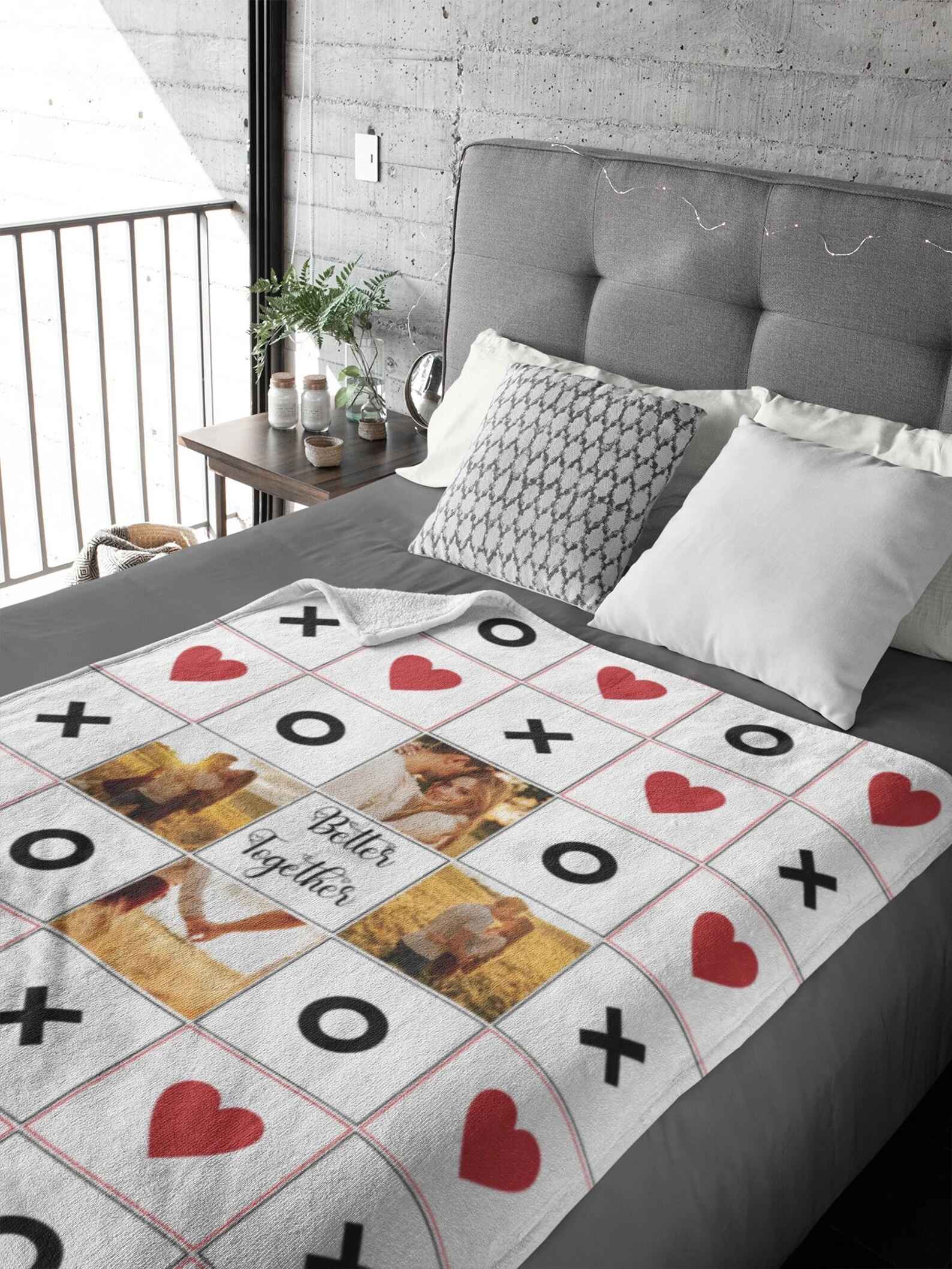 Custom couple Tic-Tac-Toe photo blanket with personalized photos and text.

