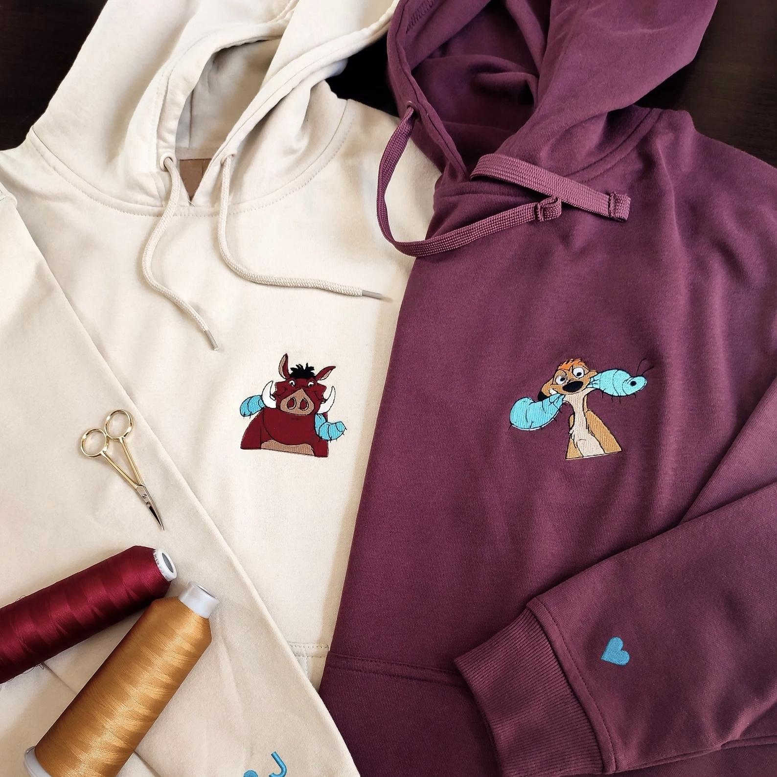 Matching Couple Hoodies featuring couples matching hoodies with Timon and Pumbaa designs.
