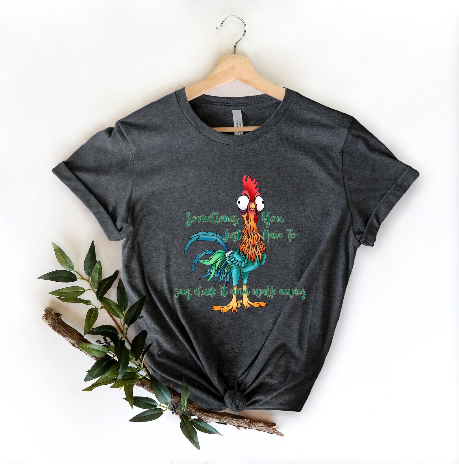 Funny rooster graphic tee with the phrase "Say Cluck It and Walk Away".