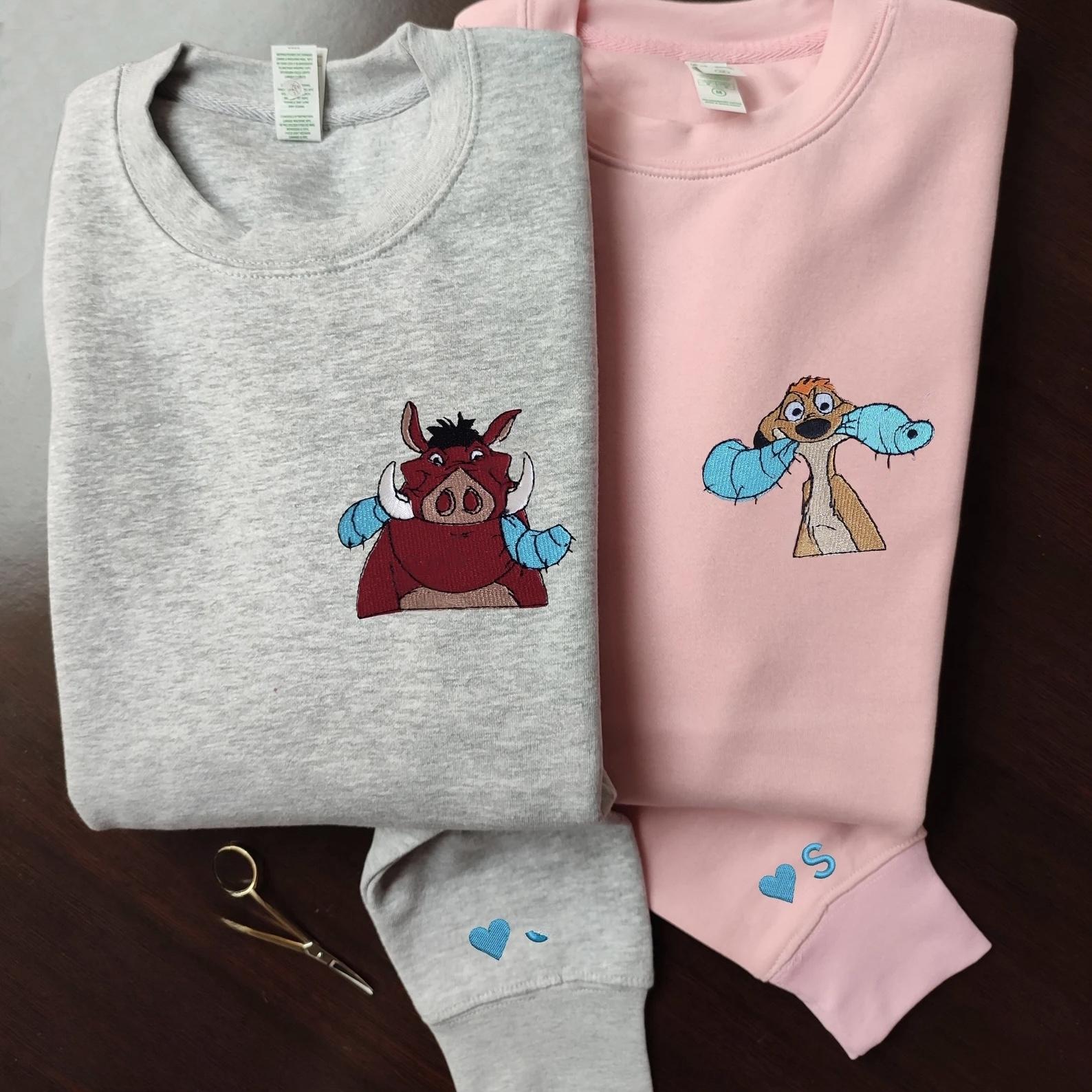 Matching Couple Hoodies featuring couples matching hoodies with Timon and Pumbaa designs.
